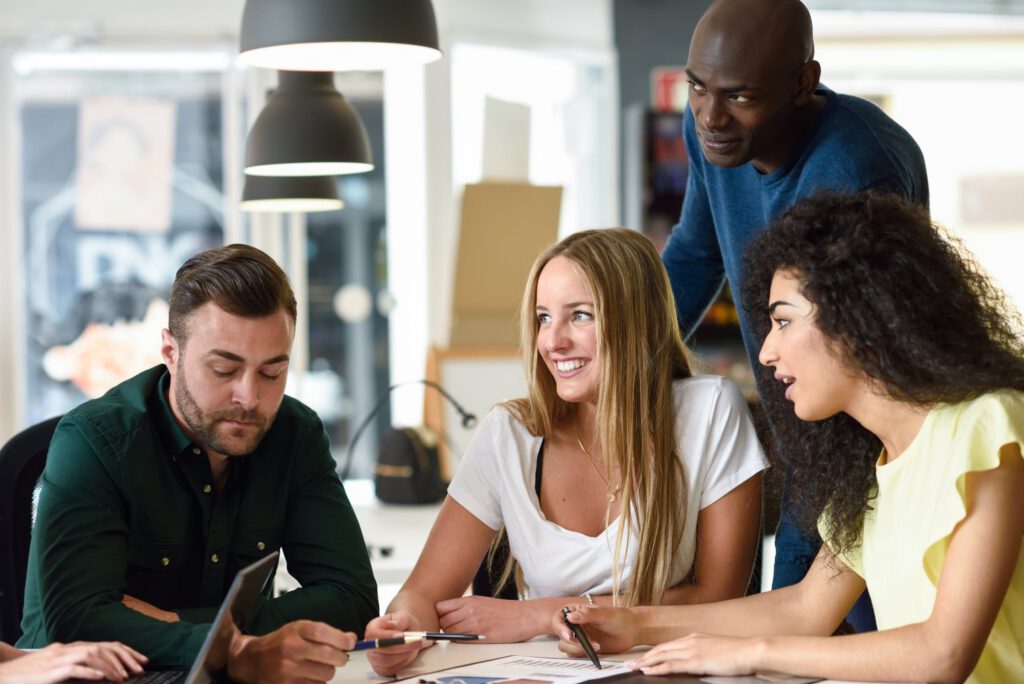 Multidisciplinary behavioral health care team collaborating during a planning session